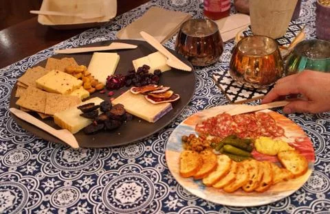 Madison, WI USA. Jul 2018. A Charcuterie plate with varieties of meat, nuts,  Stock Photos