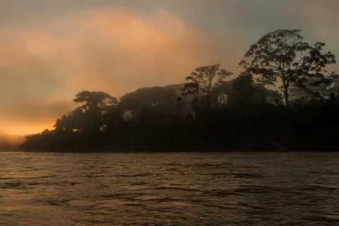 Madre de Dios river in Manu National park with scenery of tropical rain fores Stock Photos