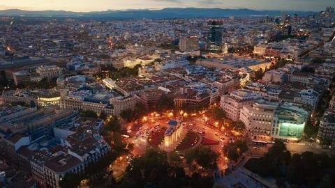Madrid drone view in the evening with night lights, downtown Madrid, Puerta de Stock Footage 287074541