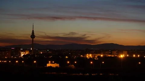 Madrid landscape during beautiful sunset with Tv tower and buildings, static  Stock Footage 136261052