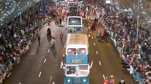 Madrid, Spain - 01/06/2024: Float riders and buses at the Three Wise Men Stockbeeldmateriaal 265210306