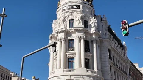 MADRID, SPAIN - 2026/09/12: Edificio Metropolis facade and statue Stock Footage 345427020