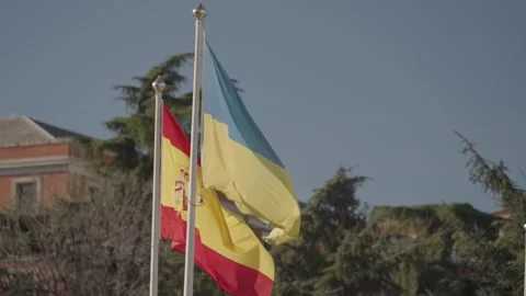 Madrid, Spain - Flags of Spain and Ukraine near Cibeles Fountain Stock Footage 242626405