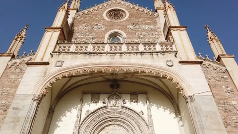 Madrid Spain Low Angle Tilt Down San Jerónimo el Real Gothic Church Facade and Stock Footage 337935897