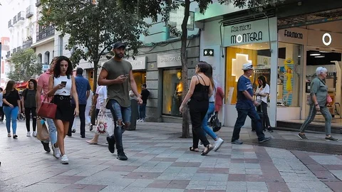 MADRID, SPAIN - SEPTEMBER 10: Timelapse view of people in the pedestrian zone on Stock Footage 100875262