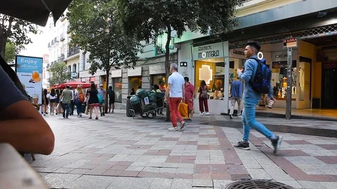 MADRID, SPAIN - SEPTEMBER 10: Timelapse view of people in the pedestrian zone on Stock Footage 100875295