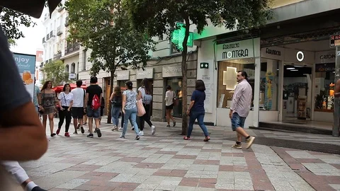 MADRID, SPAIN - SEPTEMBER 10: Timelapse view of people in the pedestrian zone on Stock Footage 100875442
