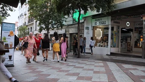 MADRID, SPAIN - SEPTEMBER 10: Timelapse view of people in the pedestrian zone on Stock Footage 100875758