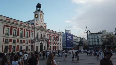 Madrid Spain Sunset Handheld View of Real Casa de Correos Clock Tower and 스톡 동영상 337936395