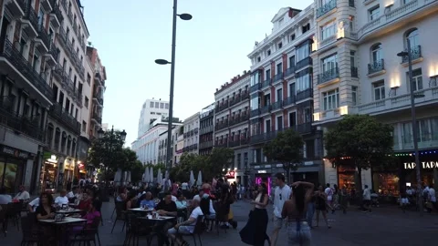 Madrid Spain Sunset Slow Pan View of Outdoor Restaurant Patio Dining and Stock Footage 337936267