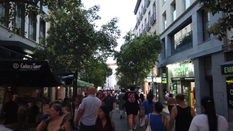Madrid Spain Sunset View of Pedestrian Crowd and Outdoor Café Patios on Montera Stock Footage 337935943