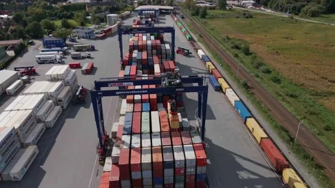 MAERSK containers on terminal with cranes for loading Stock Footage 228929849