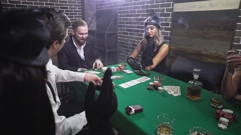 Mafioso lights a cigarette at the poker table Video stock 107225580