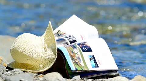 Magazine and hat. Stock Footage 24642693