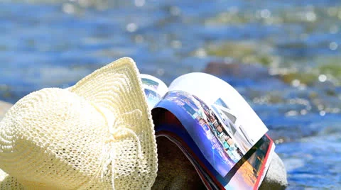 Magazine and hat. Stock Footage 24643159