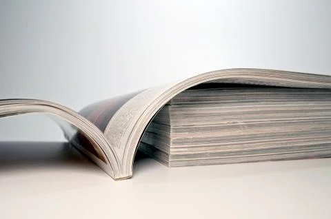 Magazine on a stack of magazines Stock Photos