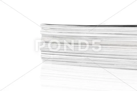 Magazines up close shot on white background Stock Photos