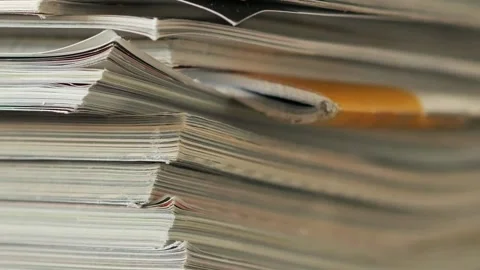 Magazines in a stack Stock Footage 199449499