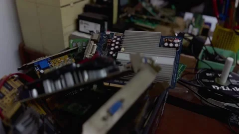 Magelang, Indonesia - 07/27/2024: Pile of broken computer parts on work Video stock 281178341