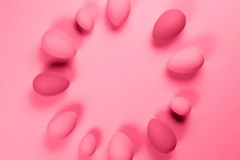 Magenta Easter eggs on a purple background 스톡 사진