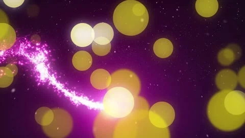 Magenta spark trail entering frame weaving through drifting gold bokeh forming Stock Footage 330114744