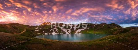 Magenta Sunset Sky at Lake Como - Poughkeepsie Pass, San Juan Mountains off E Stock Photos