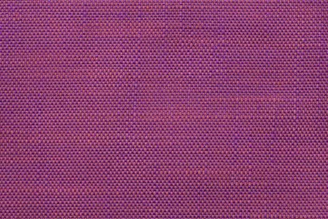 Magenta textile background with checkered pattern, closeup. Structure of the  Stock Photos