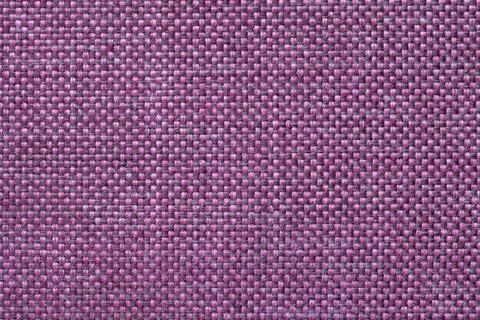 Magenta textile background with checkered pattern. Structure of fabric macro. Stock Photos