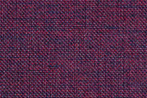 Magenta textile background with checkered pattern. Structure of fabric macro. Stock Photos