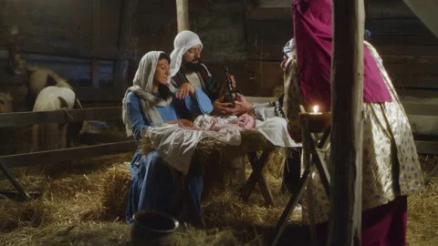 Magi giving presents to baby Jesus Stock Footage