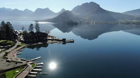 MAGIC AERIAL VIEW OF THE CASTLE OF DUINGT FROM THE BAY OF TALLOIRES 스톡 동영상 147684908