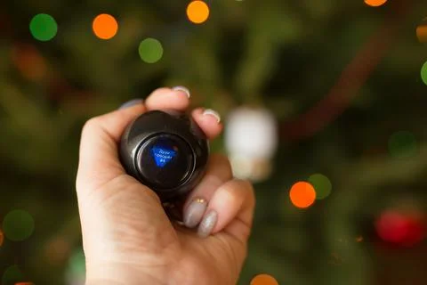 Magic ball on the background of the Christmas tree. Stock Photos