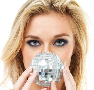The magic ball of dance. Portrait of a gorgeous young blonde woman holding a Stock Photos
