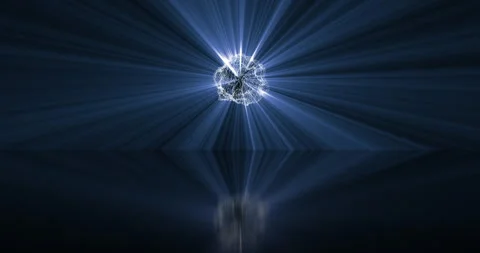 A magic ball with rays of light and reflection on the mirror floor Stock Footage 309858809