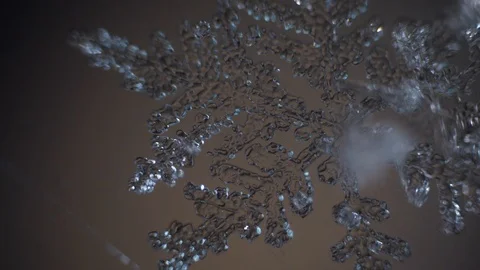 The magic of the birth of a new snowflake Stock Footage 104925644