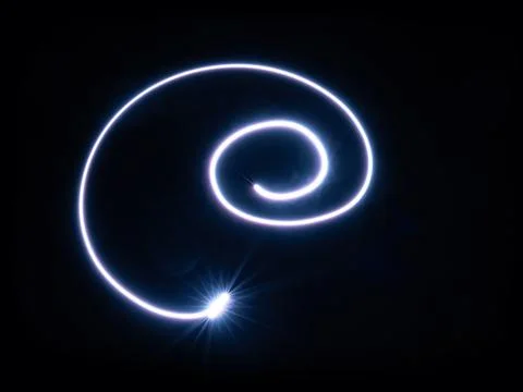 Magic blue light spirals on black background. Foto stock
