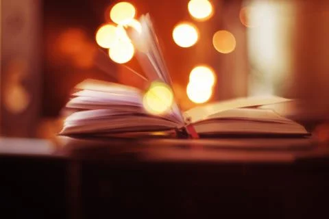 Magic book with bokeh Stock Photos