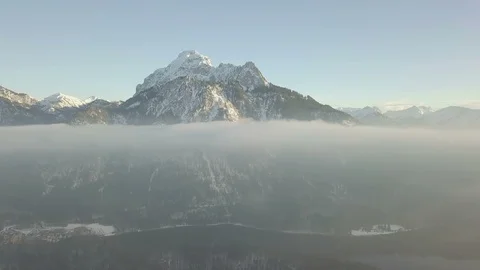 Magic camera zoom out flight through the cloud with the mountain view Stock Footage 86139181