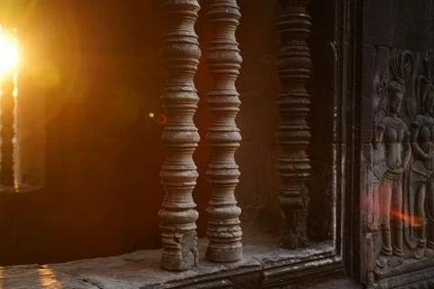 Magic color sun's rays light through the window in Angkor Wat Stock Photos