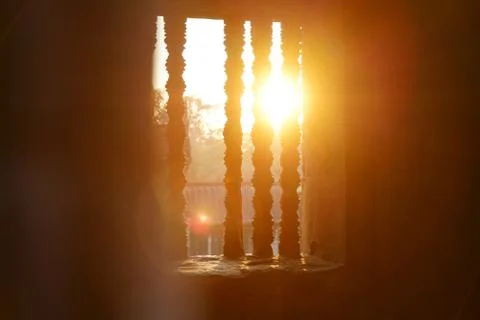 Magic color sun's rays light through the window in Angkor Wat Stock Photos