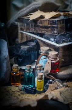 Magic concept. Different Potions in small bottle Stock Photos