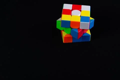 Magic cube or Rubiks cube on white background. Invention by Hungarian archi.. Stock Photos