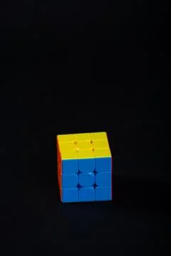 Magic cube or Rubiks cube on white background. Invention by Hungarian archi.. Stock Photos