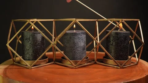 Magic decorative black candles light up for witch craft ritual.  Burning ca.. Stock Footage 307731344