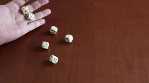 Magic dice game on a wooden table Stock Footage 103105664