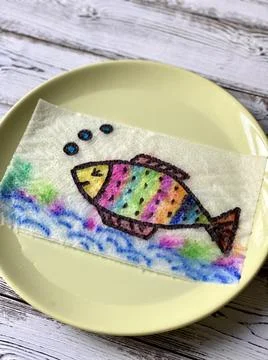 Magic, drawing fish, appears in the water, coloring book. Stock Photos