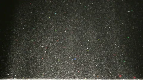 The magic floating of silvery particles. slow motion Stock Footage 160060089