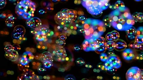 The magic flying of colorful soap bubbles. slow motion Stock Footage 163321658