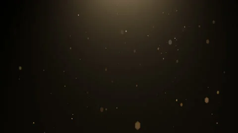 Magic flying particles in air with warm light on dark background. 4k 3840x2160. Stock Footage 144081543