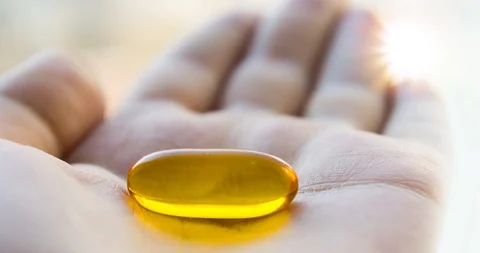 Magic healing pill in hand Stock Footage 93192552